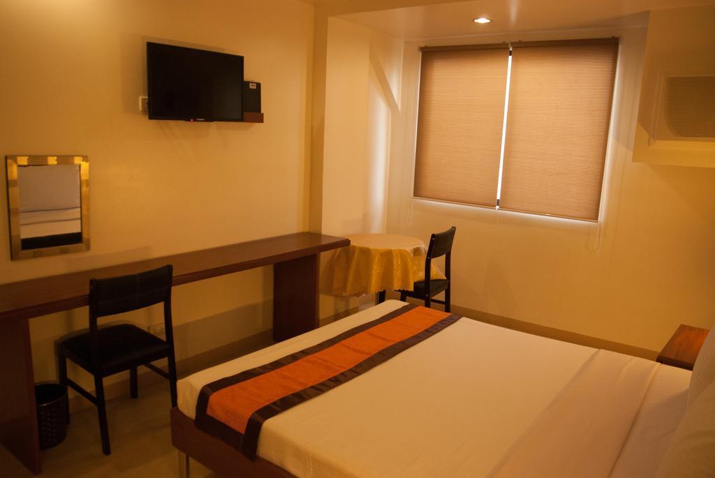 M Suites Hotel Makati City Quarto foto