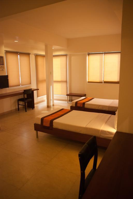M Suites Hotel Makati City Quarto foto