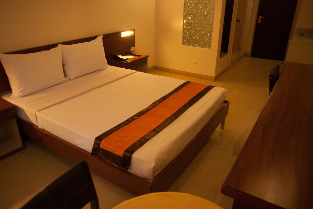 M Suites Hotel Makati City Quarto foto